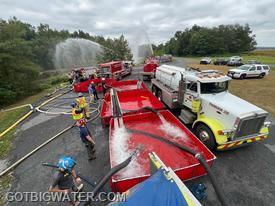 Four dump tanks, two fill sites, and eight tankers were used to support this 1500 gpm operation. (Photo courtesy Luke Zimmerman)