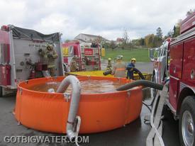 Some creative fabrication made for a pretty effective water transfer device.